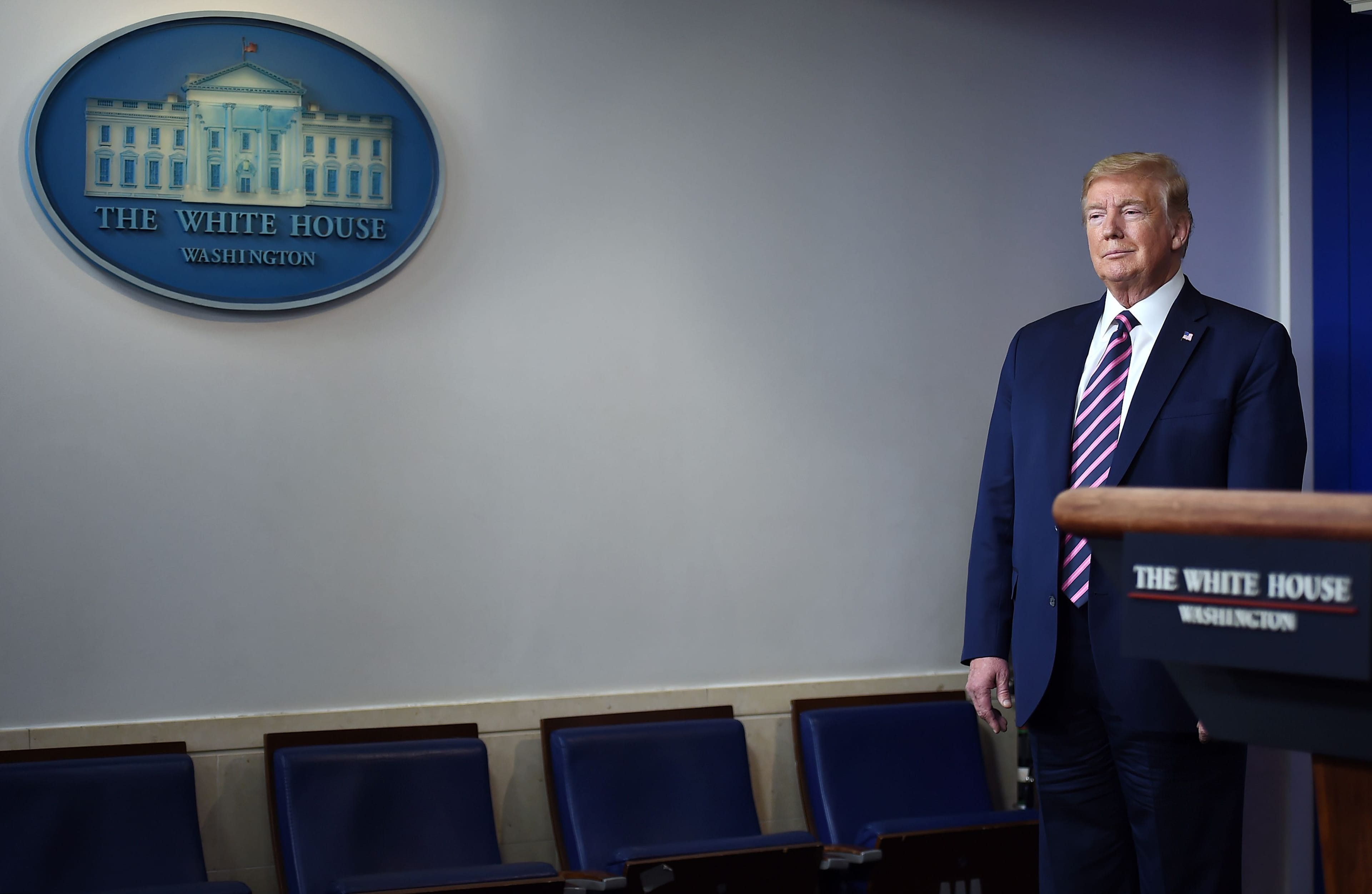 Trump looks on during the daily briefing on the coronavirus at the White House on April 24, 2020 (OLIVIER DOULIERY/AFP via Getty Images)