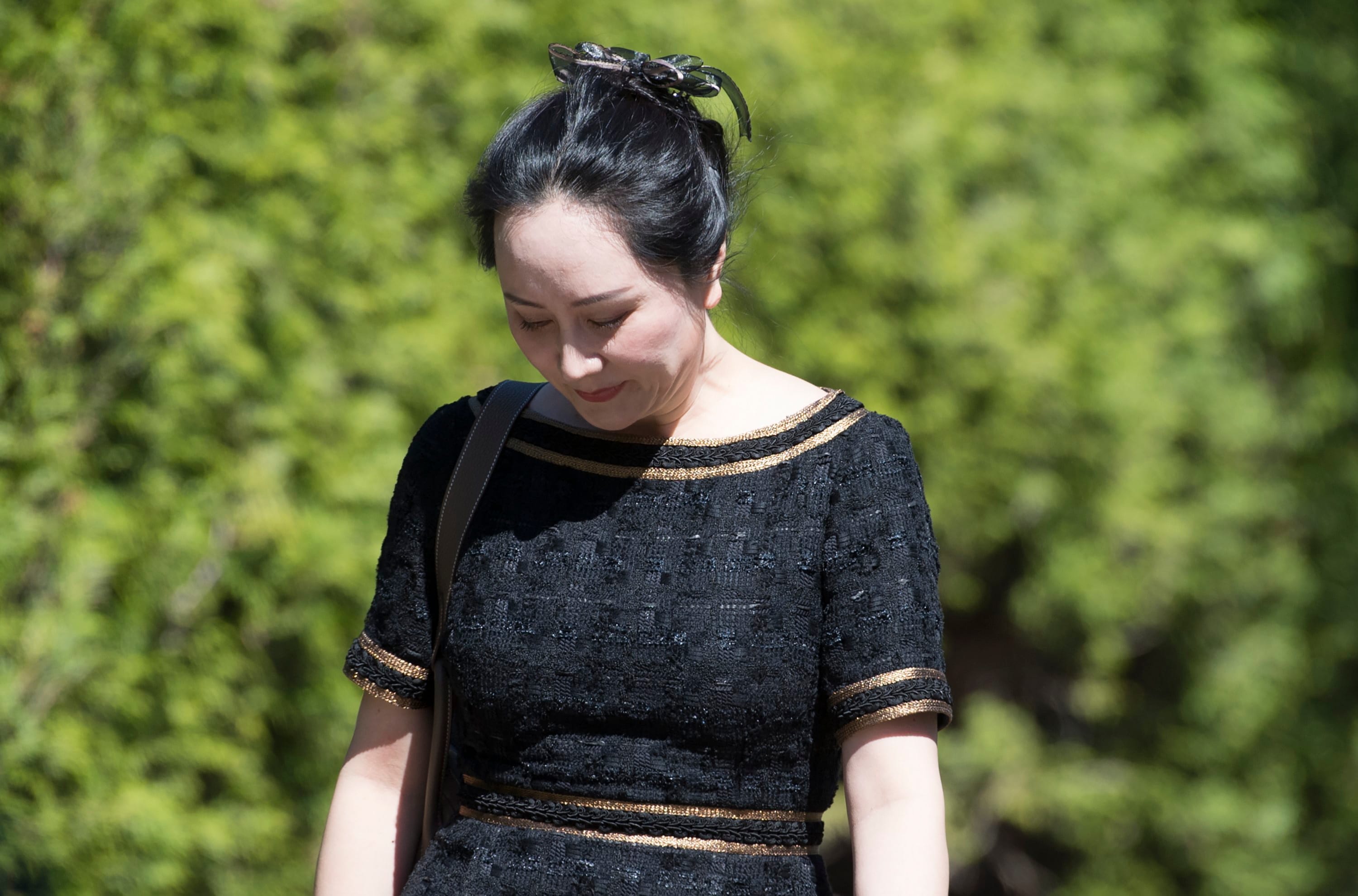 Meng leaves her home Wednesday to go to B.C. Supreme Court. (Jonathan Hayward/CP)
