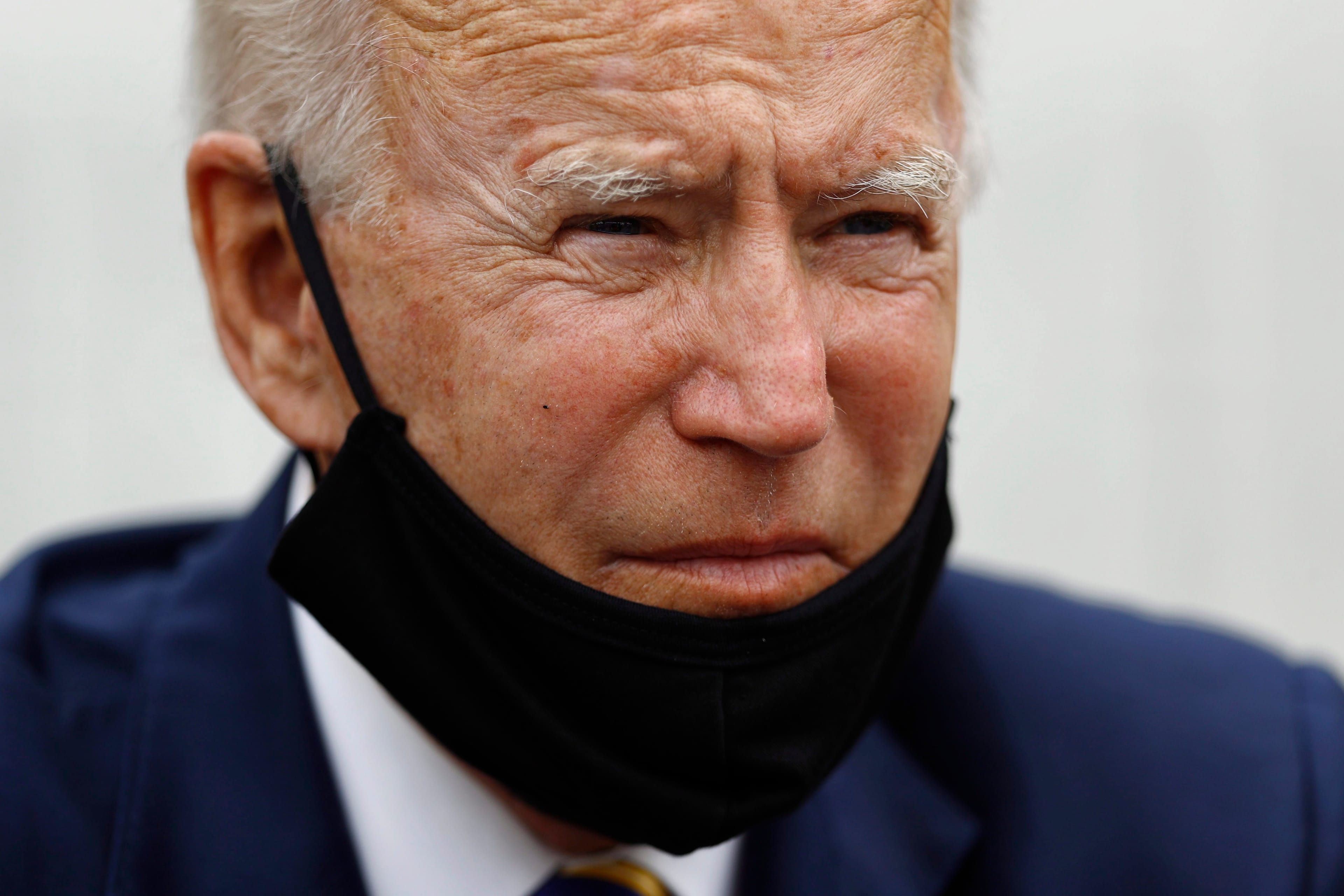 Biden listens at a meeting last week with small business owners in Pennsylvania, a key swing state (Matt Slocum/AP)