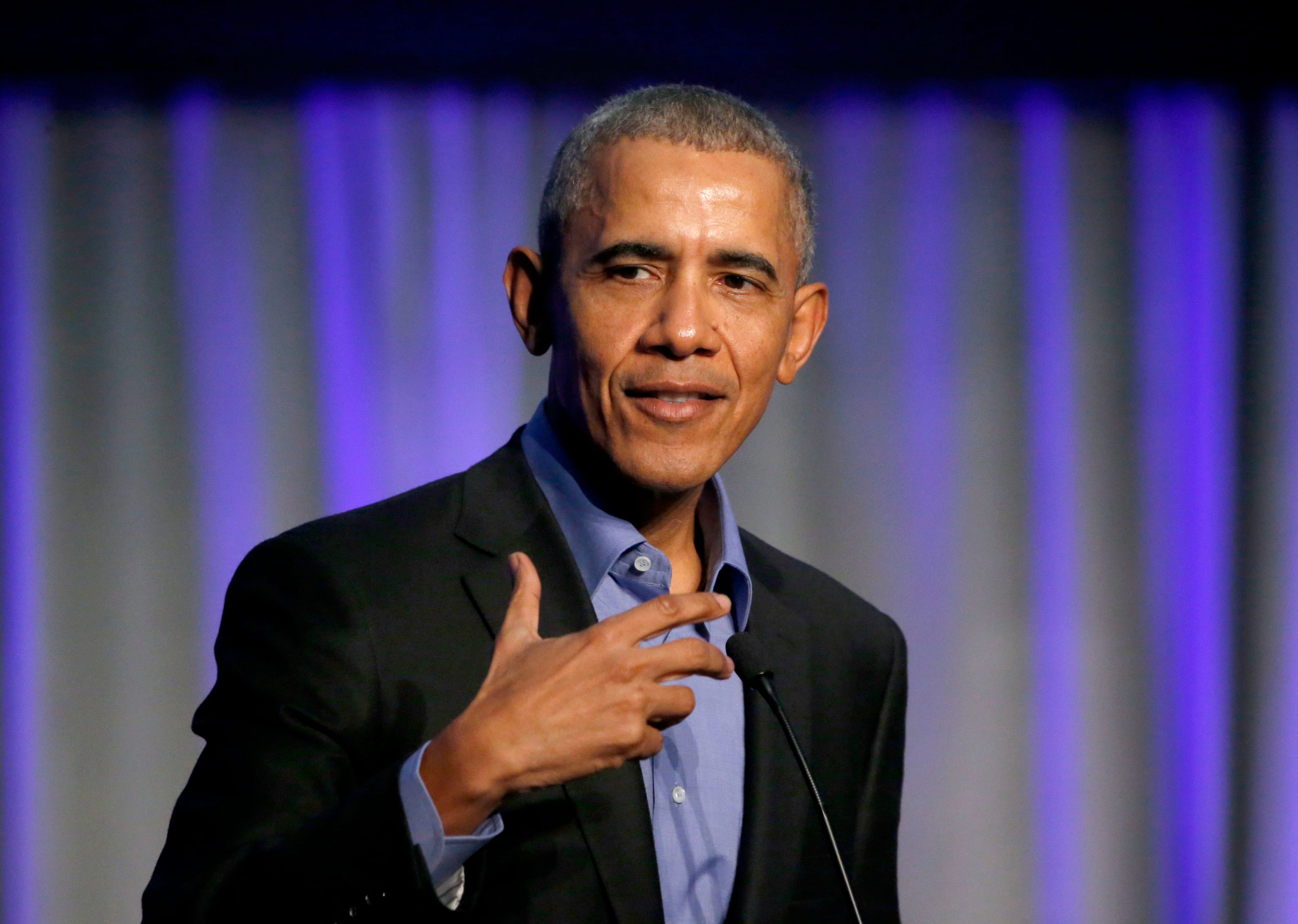 FILE - In this Dec. 5, 2017, file photo, former President Barack Obama address the participants at a summit on climate change in Chicago. Obama made an unannounced appearance at an NBA Cares event during All-Star weekend in his hometown of Chicago with several of the leagues top rookies, second-year players and coaches. The event Friday, Feb. 14, 2020, was for volunteers to fill several backpacks with school supplies, and that work predictably stopped when Obama walked into the room.(AP Photo/Charles Rex Arbogast, File)