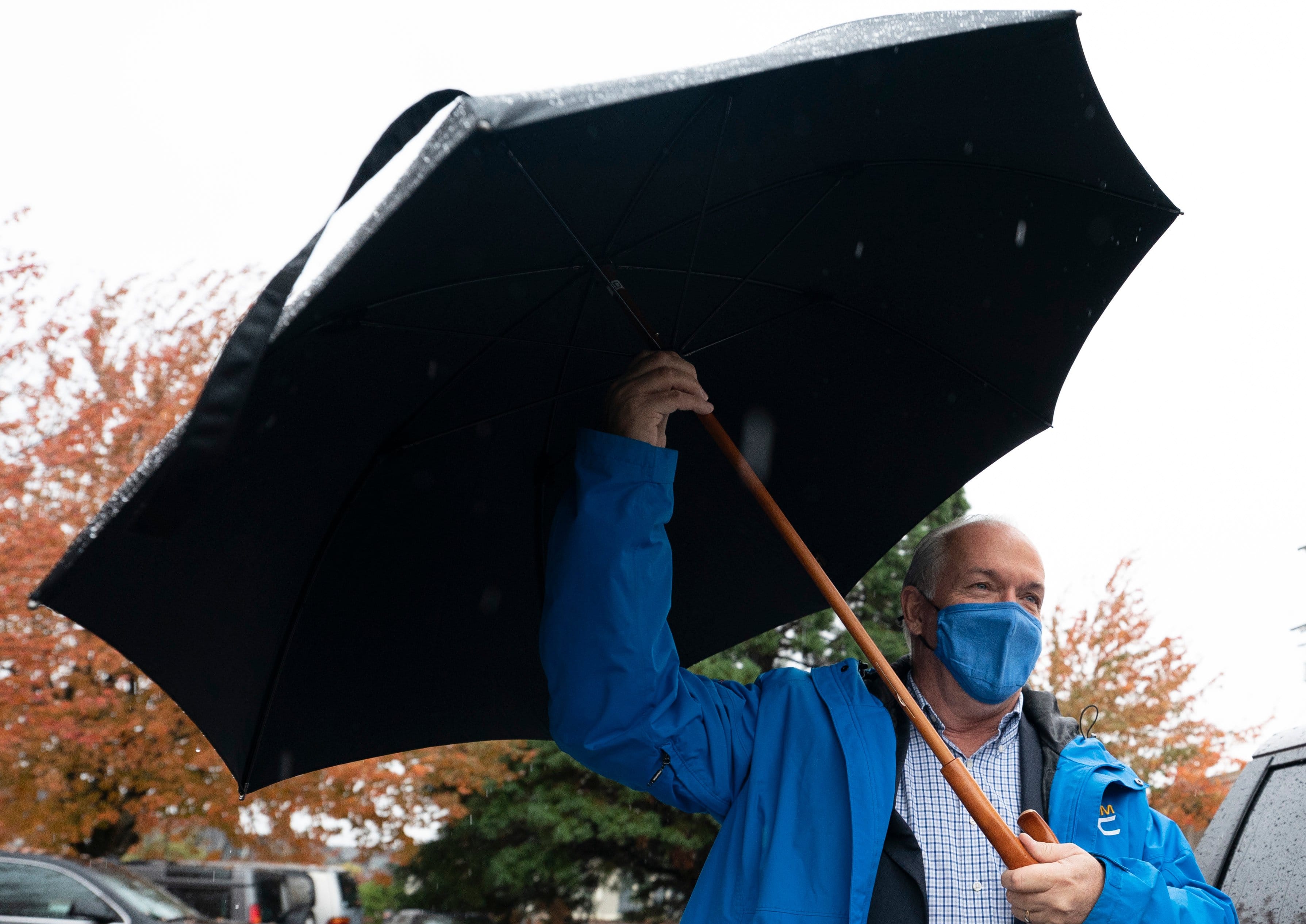 Horgan leaves a campaign stop in New Westminster, B.C. on Oct. 23, 2020 (CP/Jonathan Hayward)
