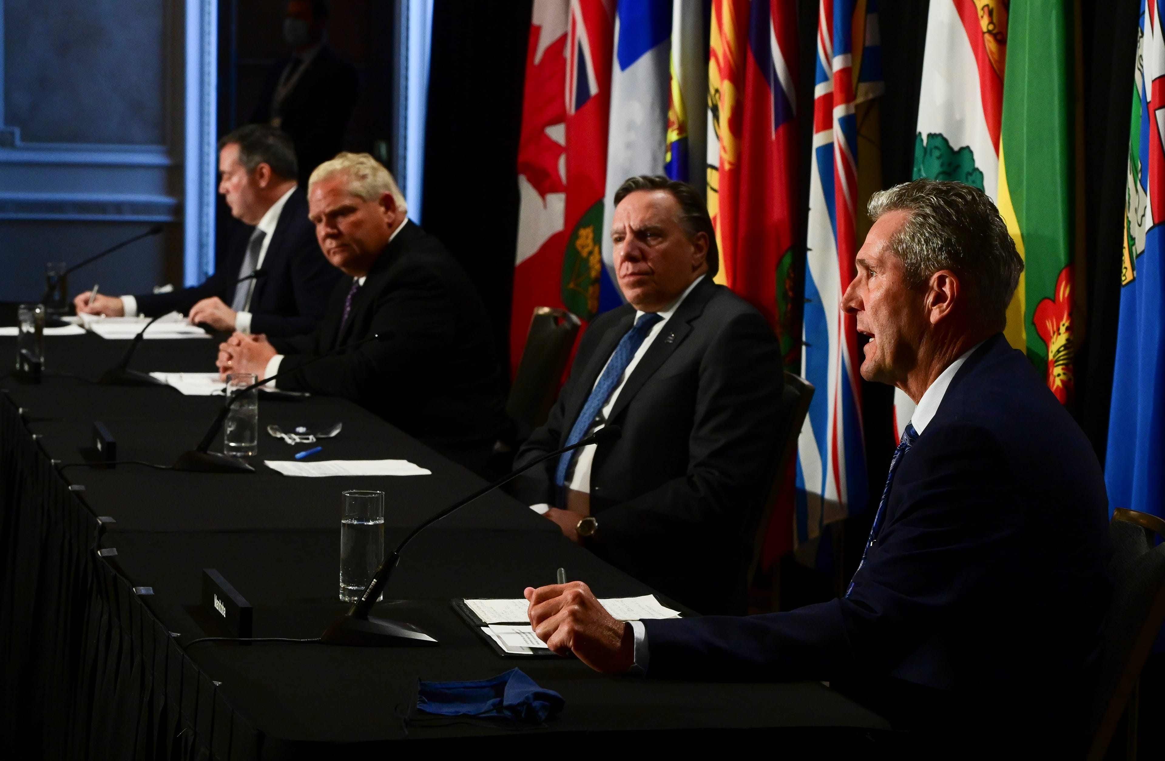 Manitoba Premier Brian Pallister, right, speaks as Quebec Premier Francois Legault, Ontario Premier Doug Ford, and Alberta Premier Jason Kenney look on during a press conference in Ottawa on Friday, Sept. 18, 2020. (Sean Kilpatrick/CP)
