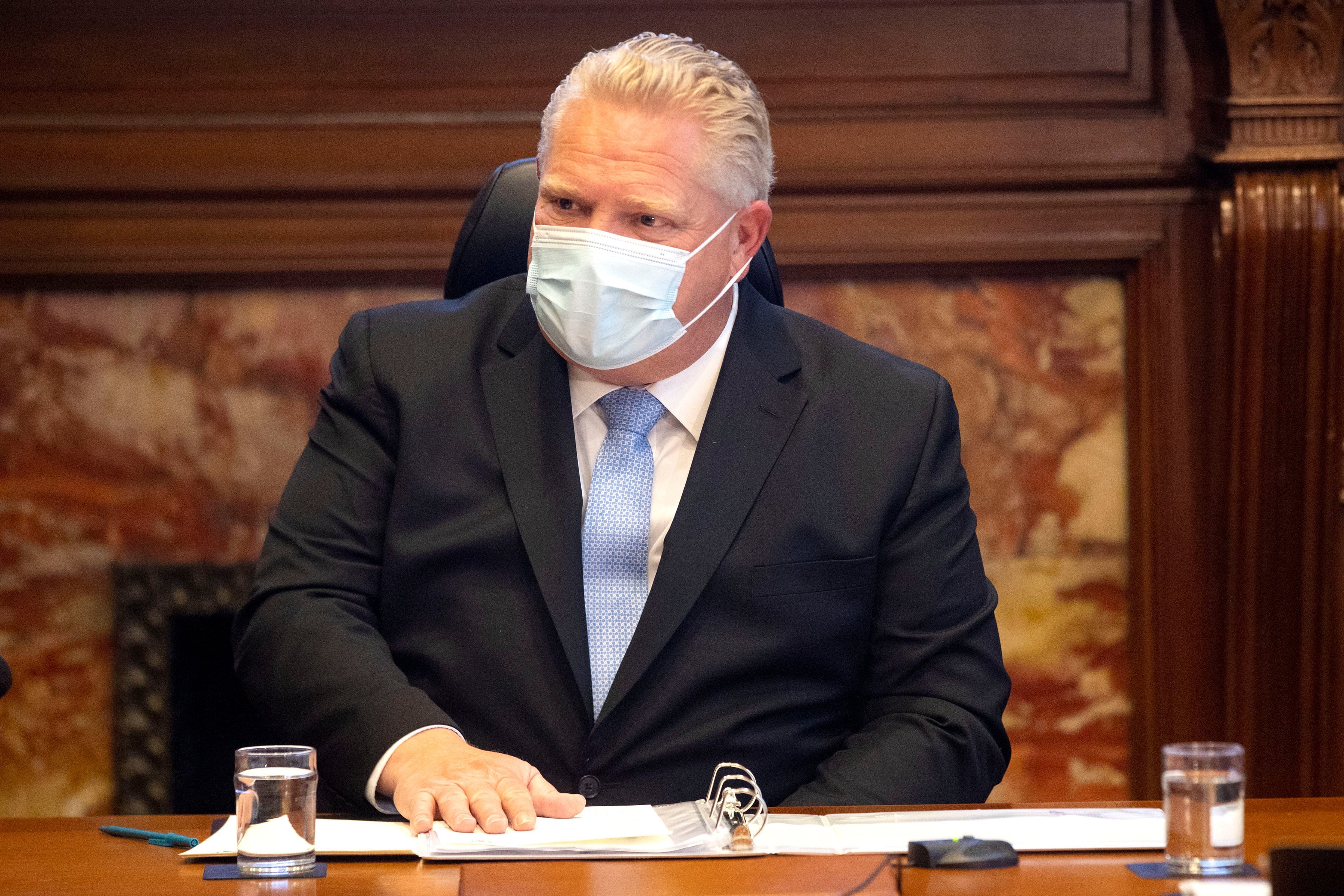 Ontario Premier Doug Ford, right, speaks during a COVID-19 Vaccine Distribution Task Force meeting at the Queen's Park in Toronto on Friday December 4, 2020. THE CANADIAN PRESS/Chris Young