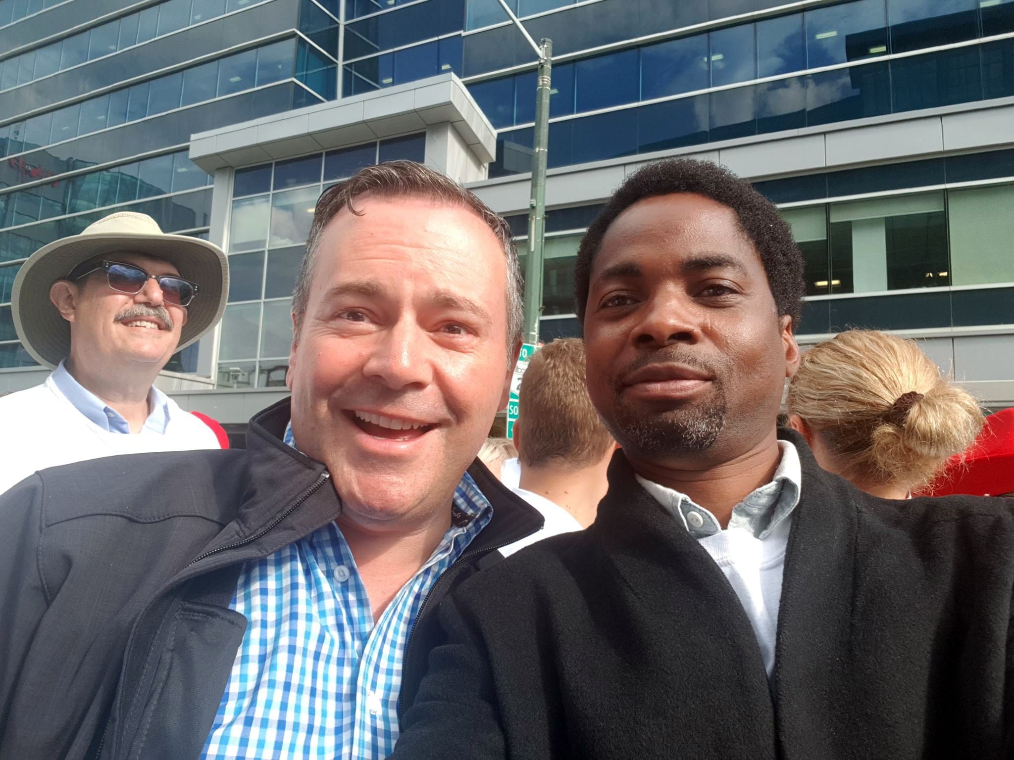 Tunde Obasan with Jason Kenney (Courtesy of Tunde Obasan)