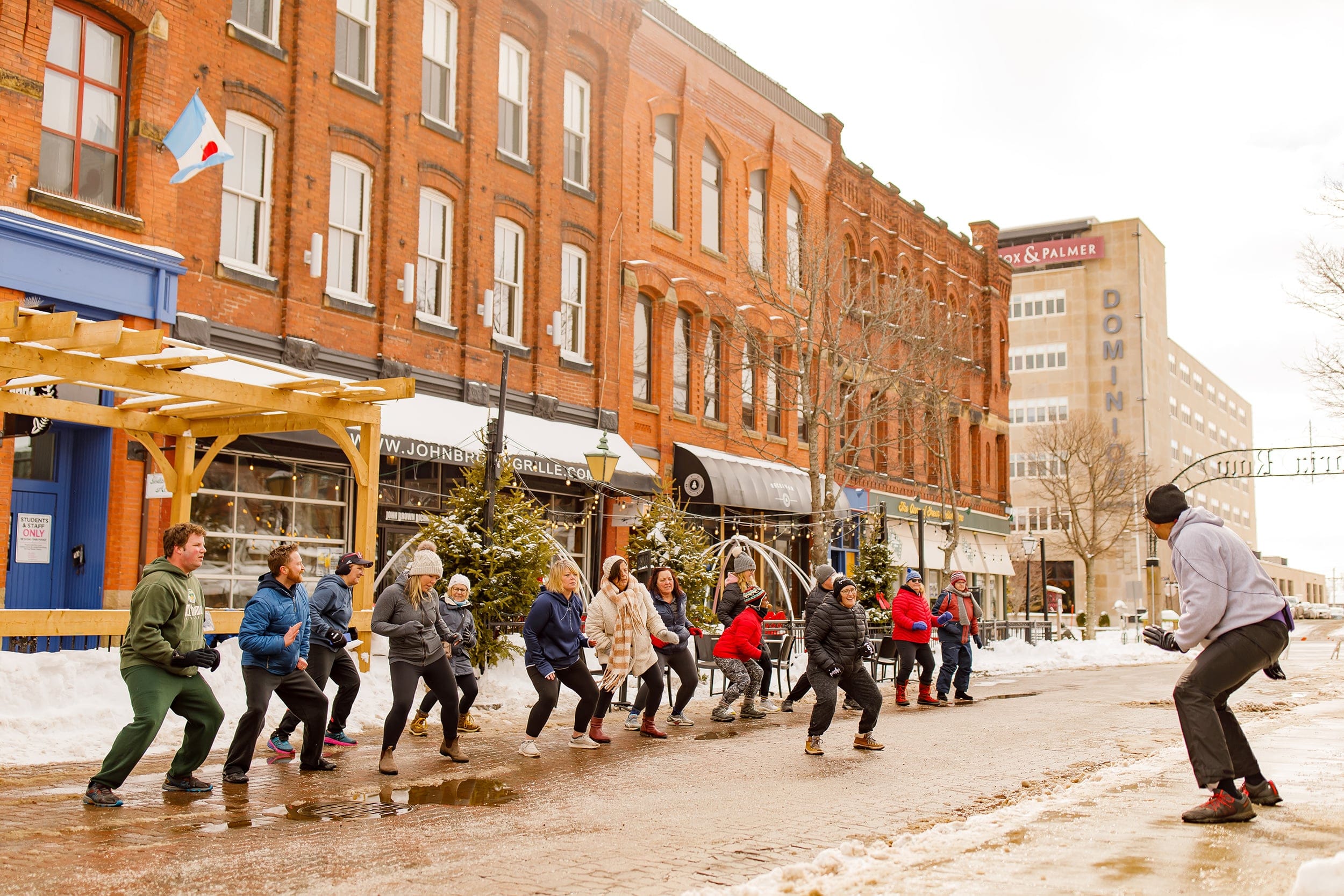 Charlottetown residents take part in a free outdoor fitness class; the city scored well in the community engagement category of our ranking (Courtesy of DiscoverCharlottetown.com)