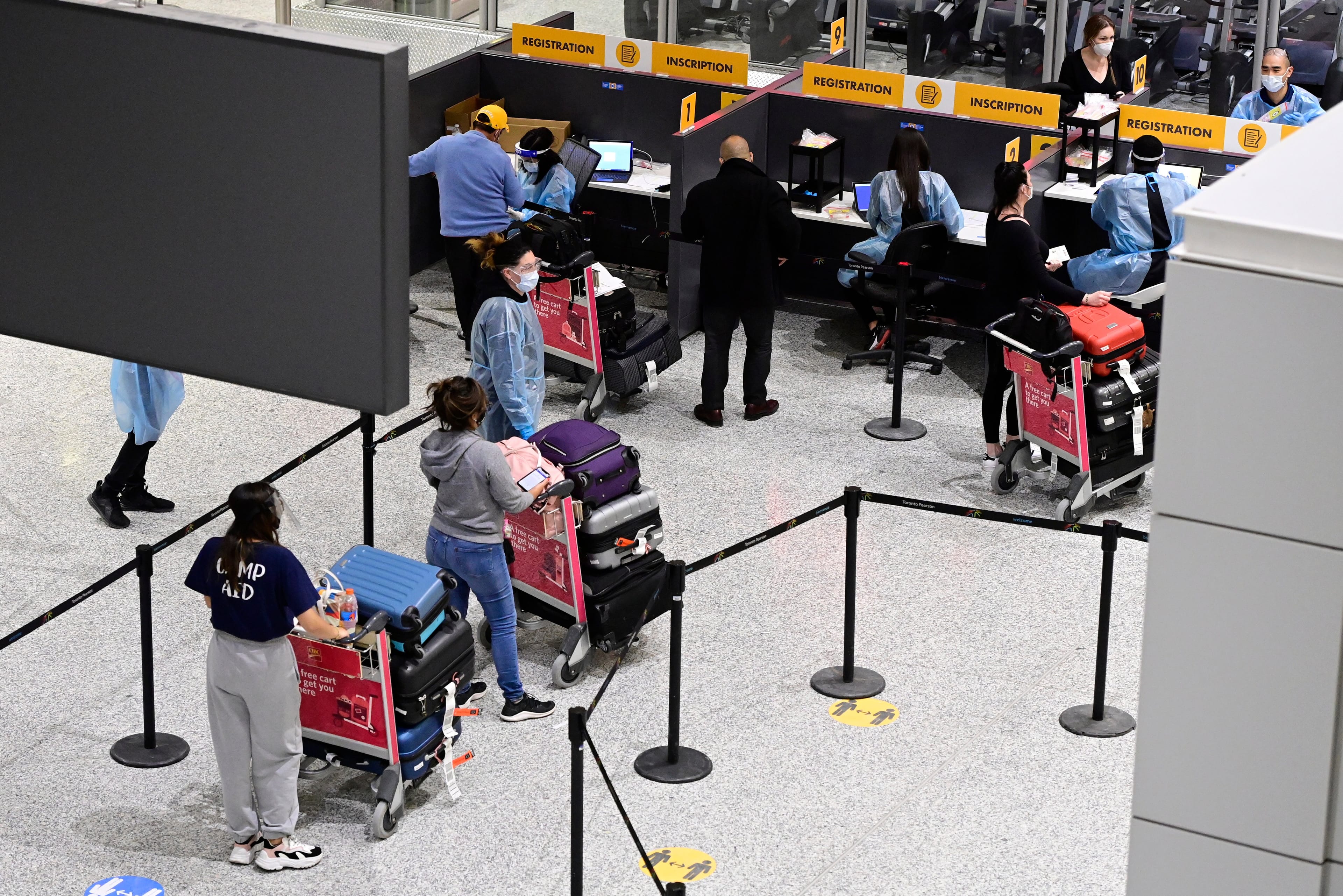 Travellers arriving at Terminal 3 at Pearson Airport in Toronto early Monday, February 22, 2021. THE CANADIAN PRESS/Frank Gunn