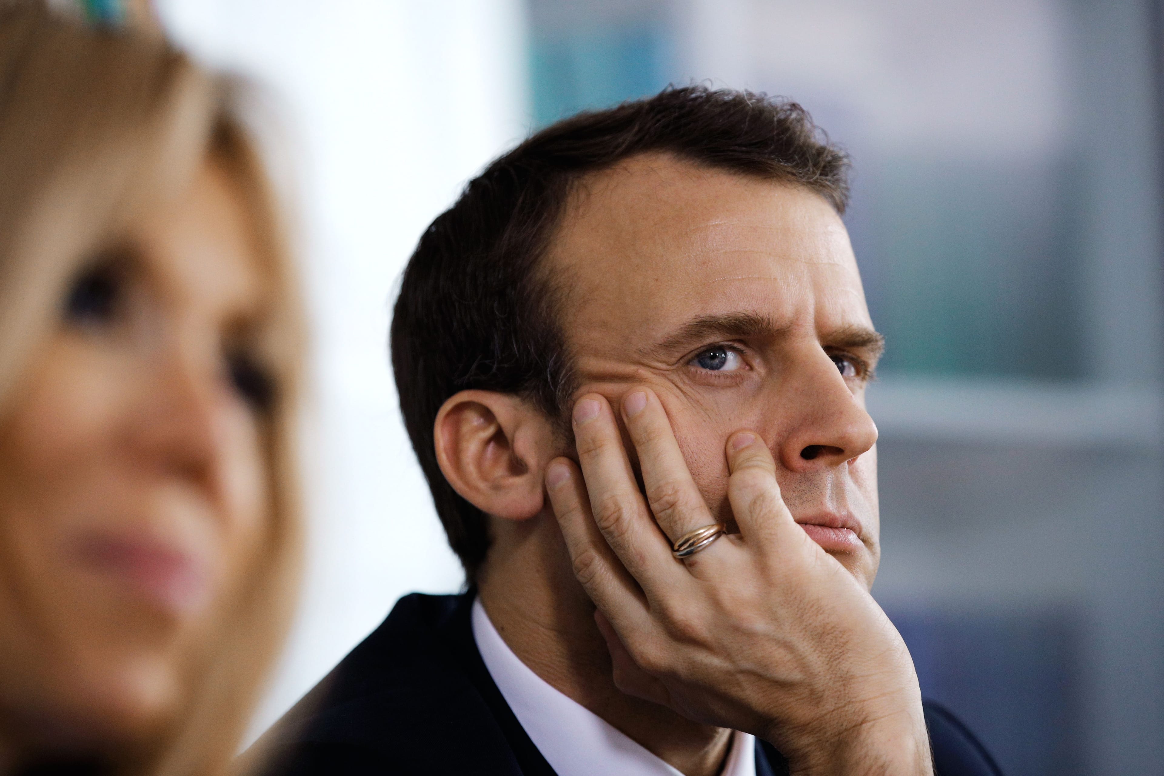 Macron and his wife Brigitte Macron visit a hospital in Normandy, on April 5, 2018 (CHRISTOPHE ENA/AFP via Getty Images)