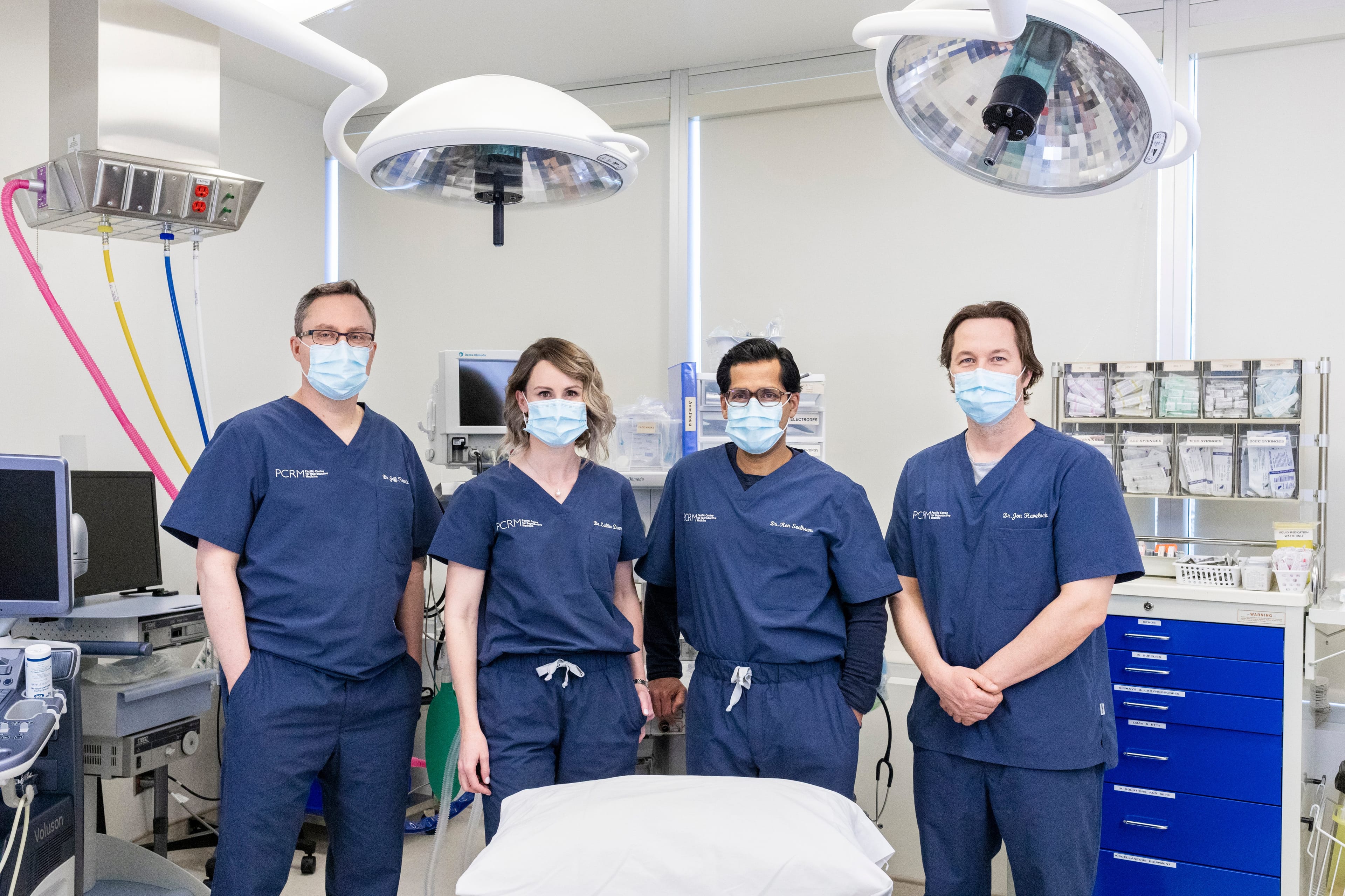 Four doctors in full scrubs at the pacific centre of reproductive medicine