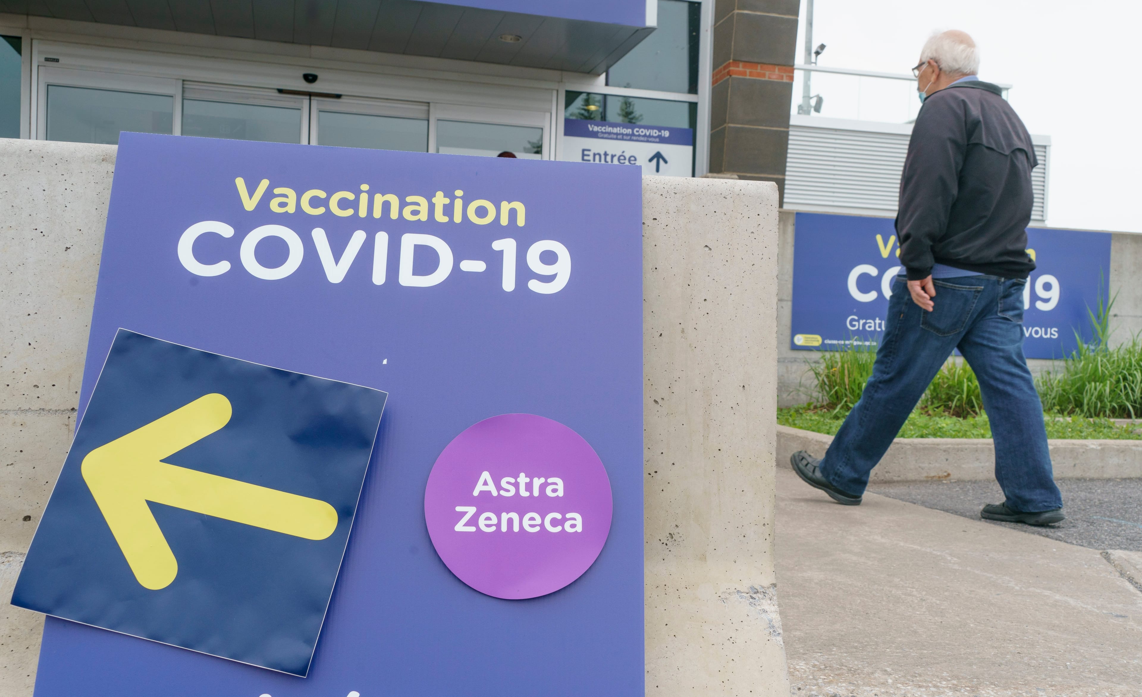 A man arrives at a COVID-19 vaccination clinic in Montreal, on Tuesday, June 1, 2021. THE CANADIAN PRESS/Paul Chiasson
