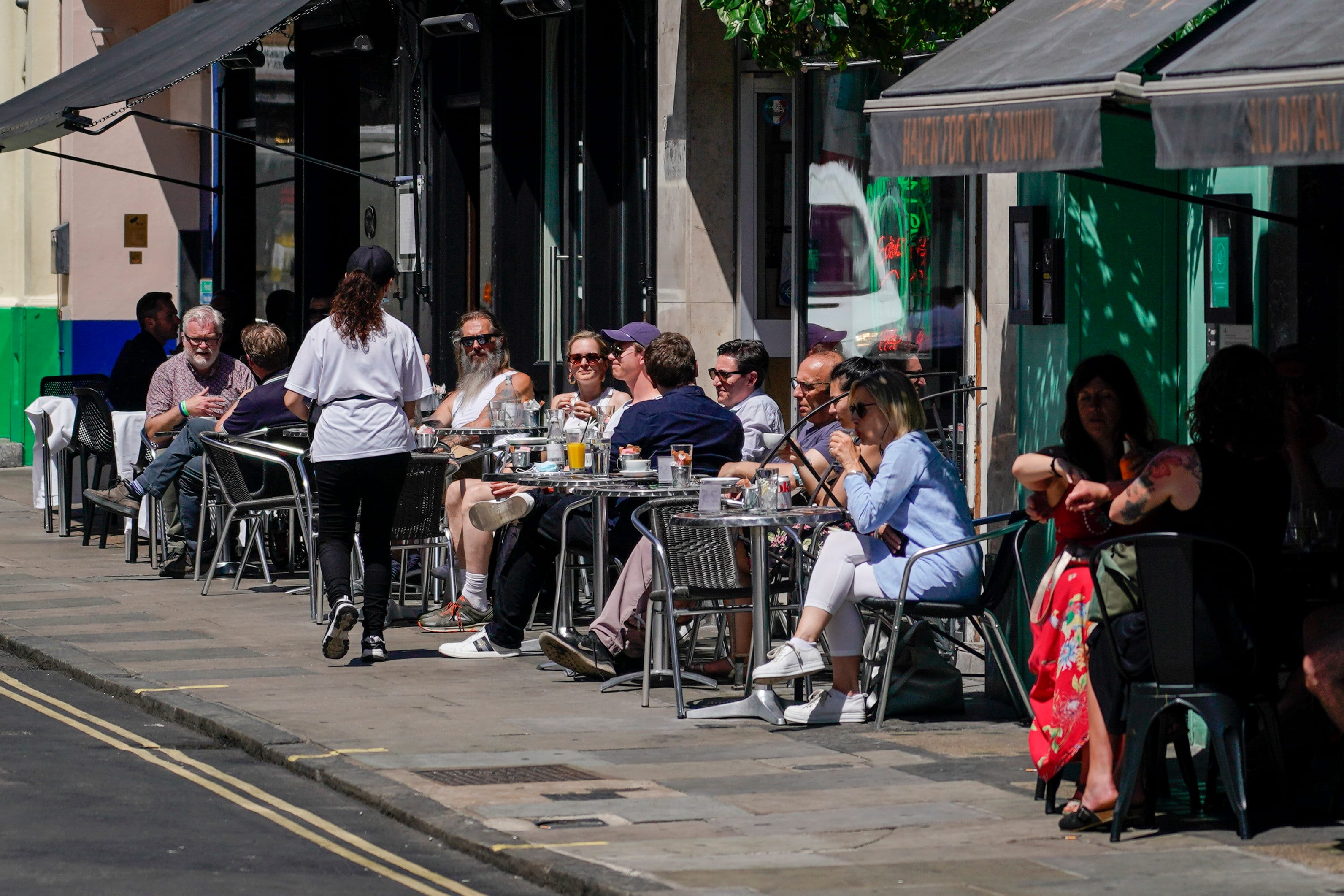 Patrons at a restaurant in Soho, in London. British Prime Minister Boris Johnson delayed the next planned relaxation of coronavirus restrictions in England due to the spread of the delta variant. (Alberto Pezzali/CP)