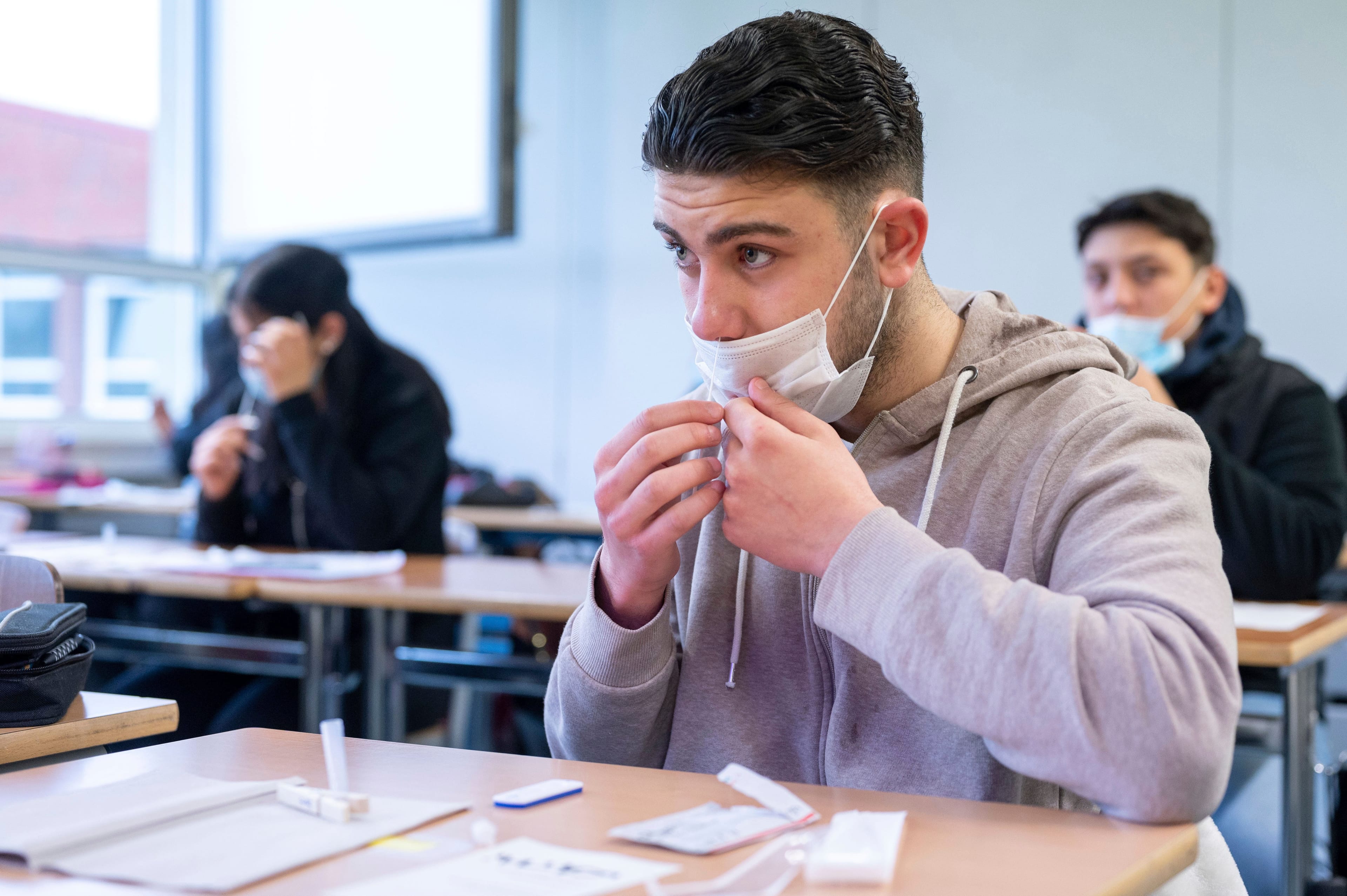 A pupil takes a Corona antigen rapid test in Cologne, Germany on Apr. 9, 2021. (Marius Becker/ AP)