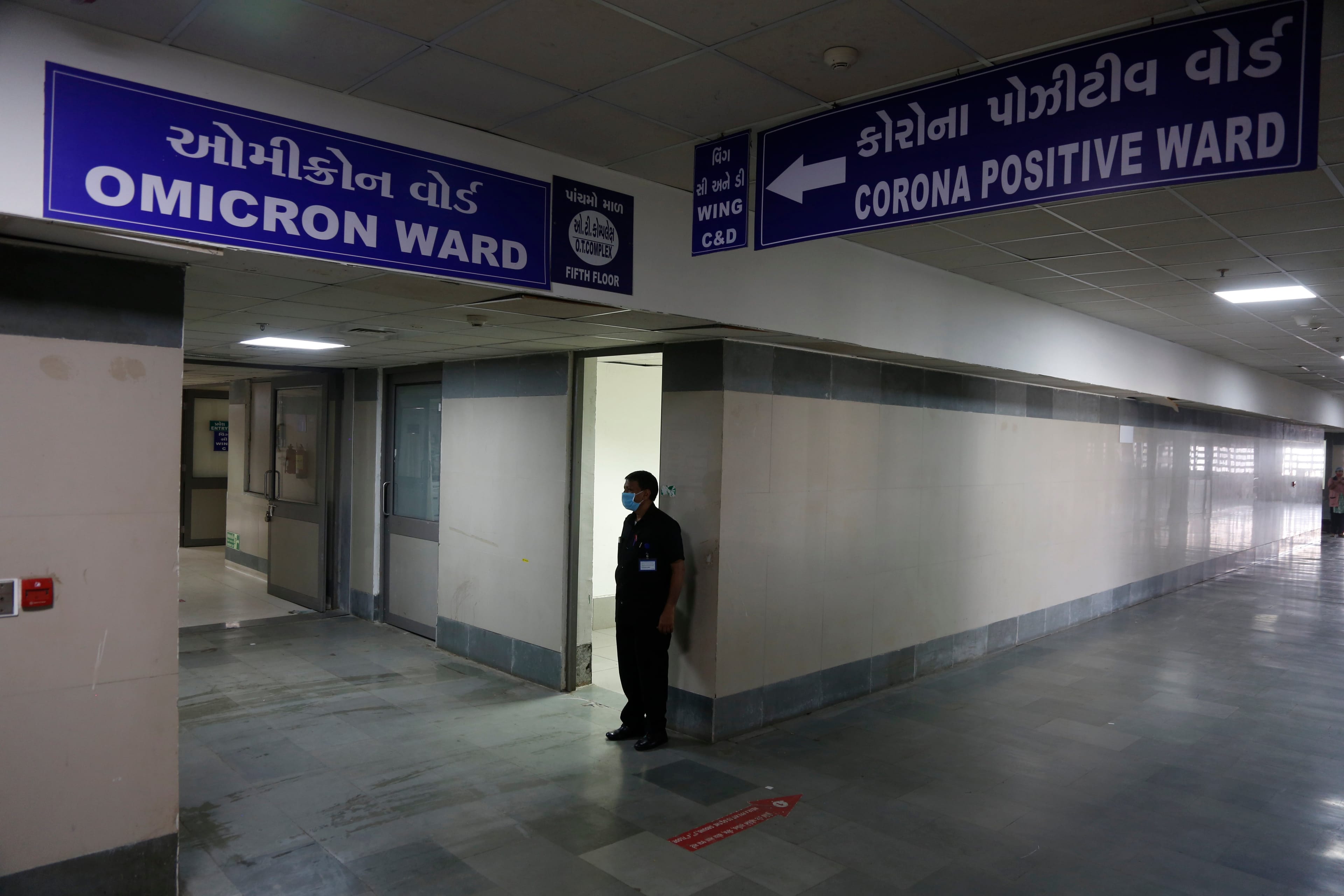 A security man stands guard outside a ward being prepared for the omicron coronavirus in Ahmedabad, India, on Dec. 6, 2021. (Ajit Solanki/AP)