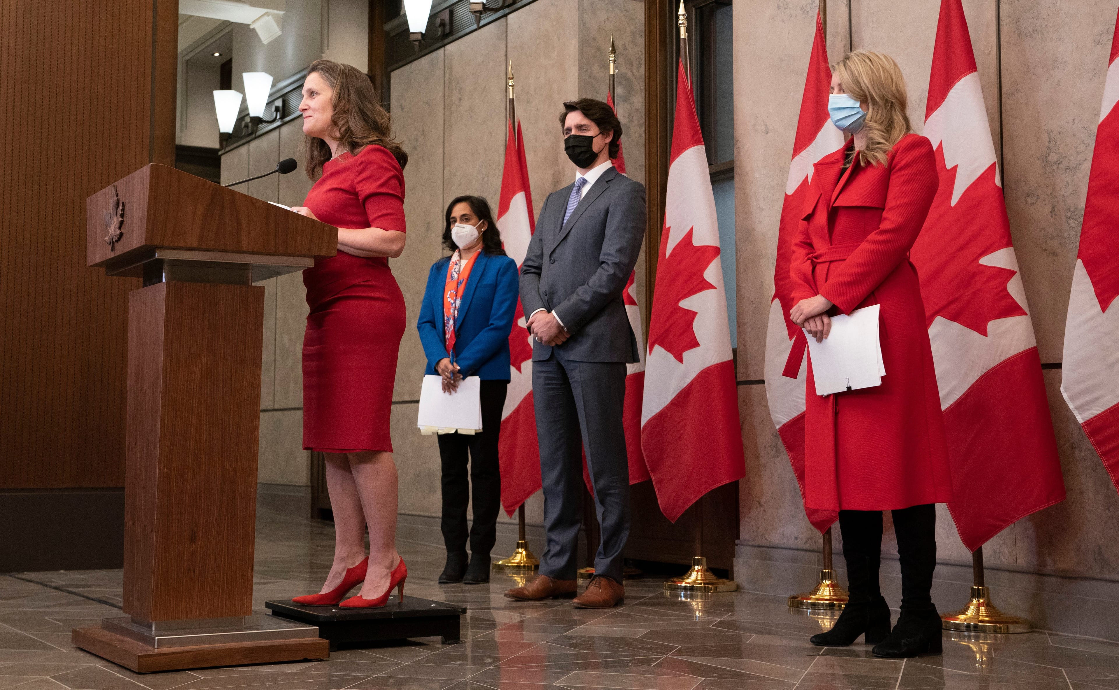 Anand, Trudeau and Joly listen to Freeland speak during a media availability following a cabinet retreat, on Jan. 26, 2022 (Adrian Wyld/CP)