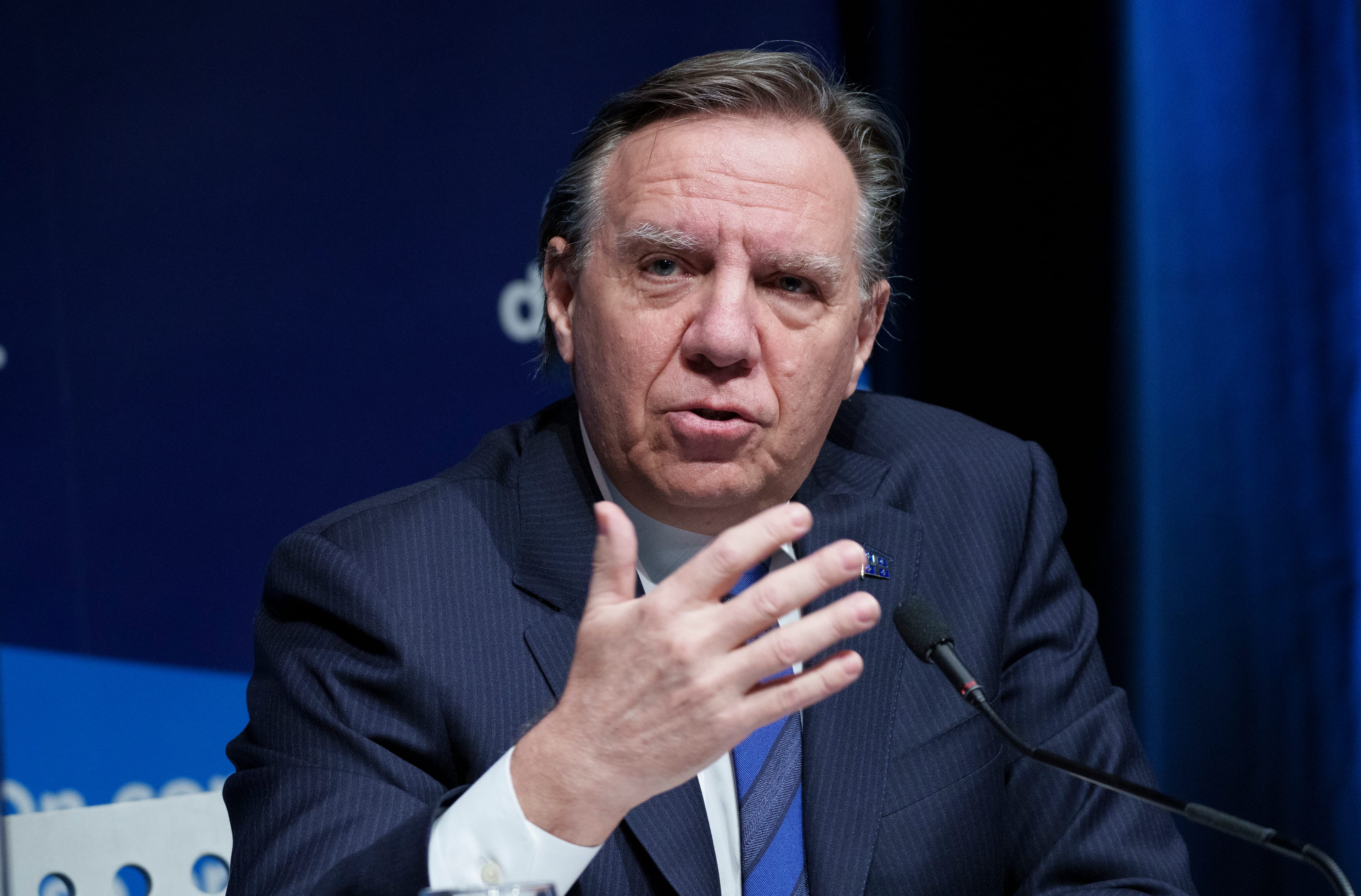 Legault responds to a question during a news conference in Montreal, Jan. 11, 2022. (Paul Chiasson/The Canadian Press)