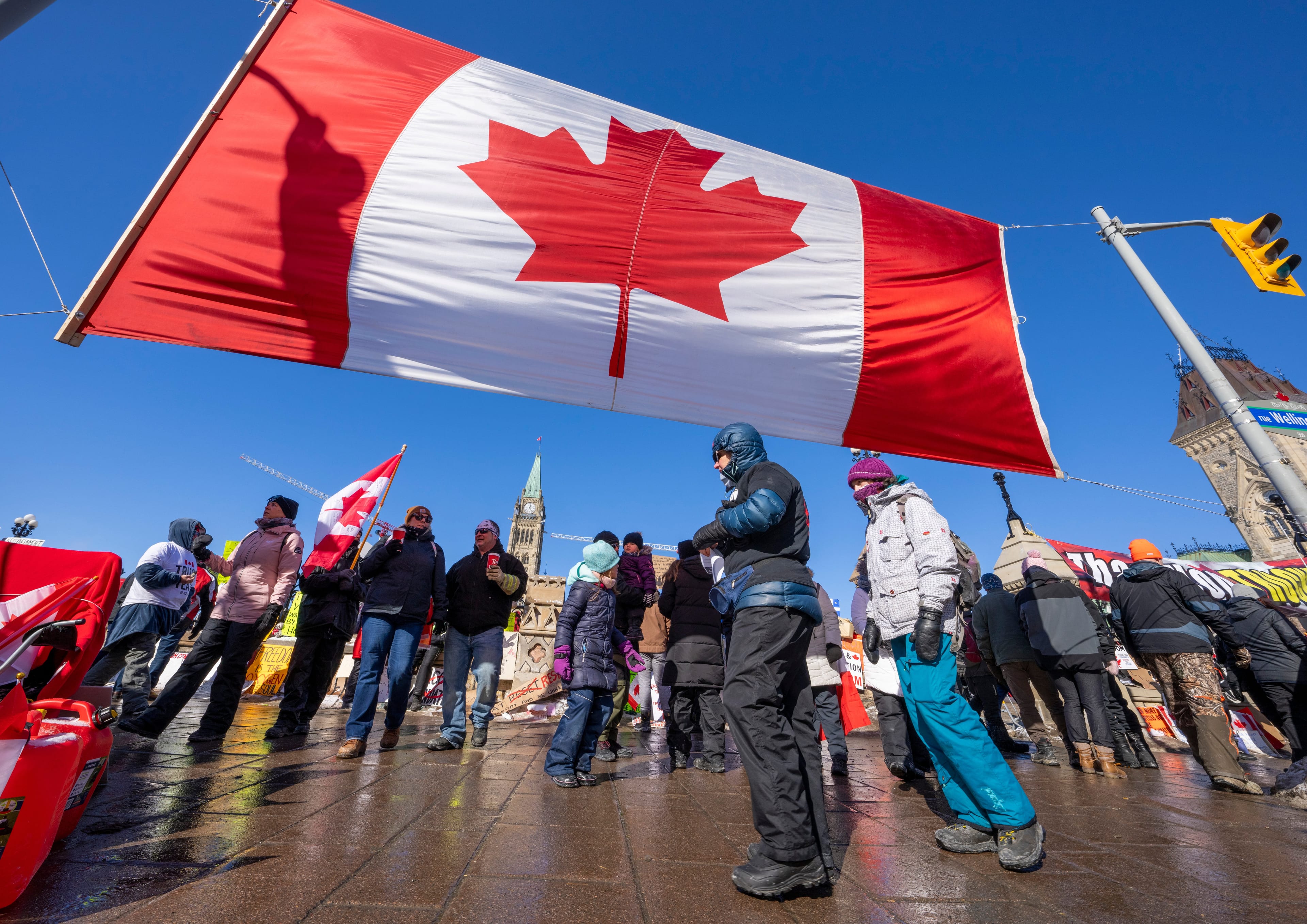 People gather for an anti-mandate protest on Parliament Hill in Ottawa, Feb. 13, 2022. (Frank Gunn/The Canadian Press)
