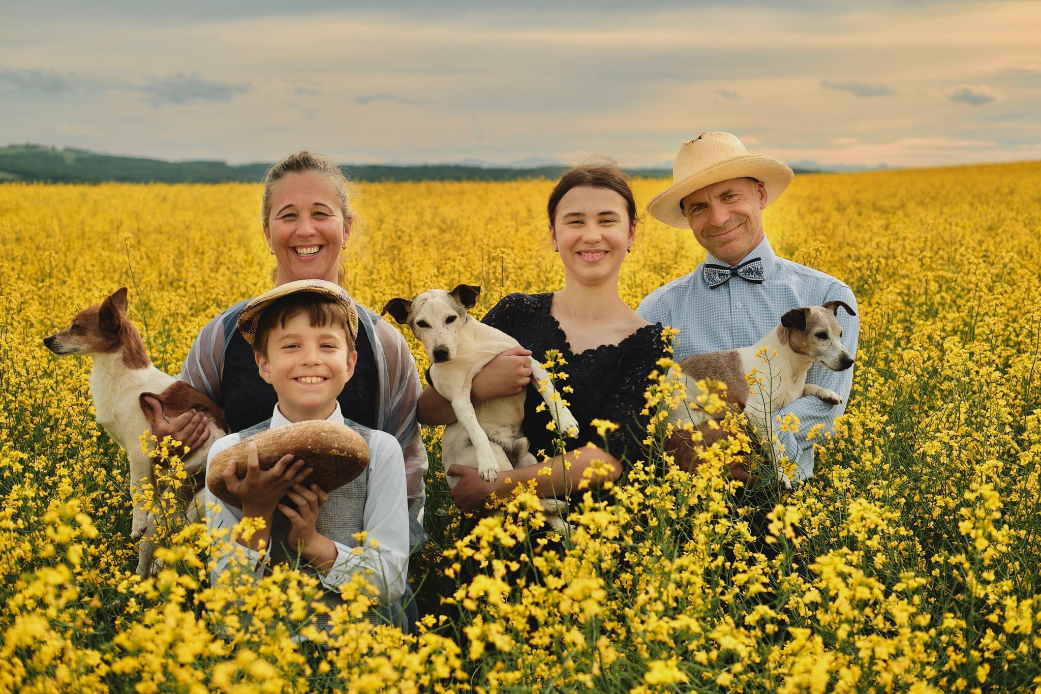 With a loan from Windmill Microlending, Eva Hadzima (back, left), a veterinarian who immigrated to Calgary from Slovakia, was able to avoid the three-year process required for her to practise in Canada and get her certification in just one week in the U.S.