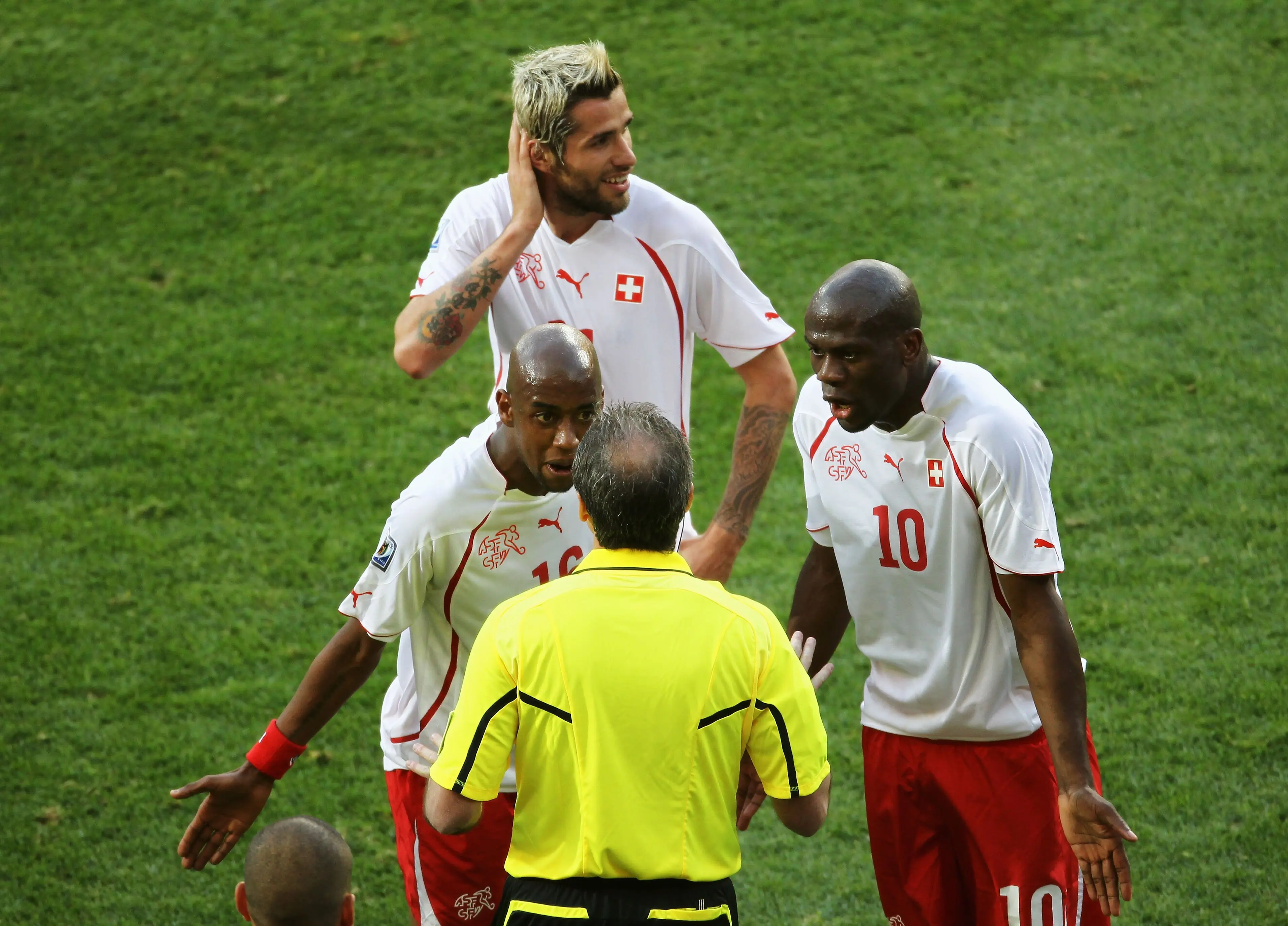 Valon Behrami (back) of Switzerland