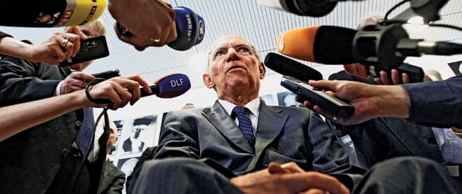 German Finance Minister Schaeuble speaks to the media as he leaves the German Constitutional Court in Karlsruhe