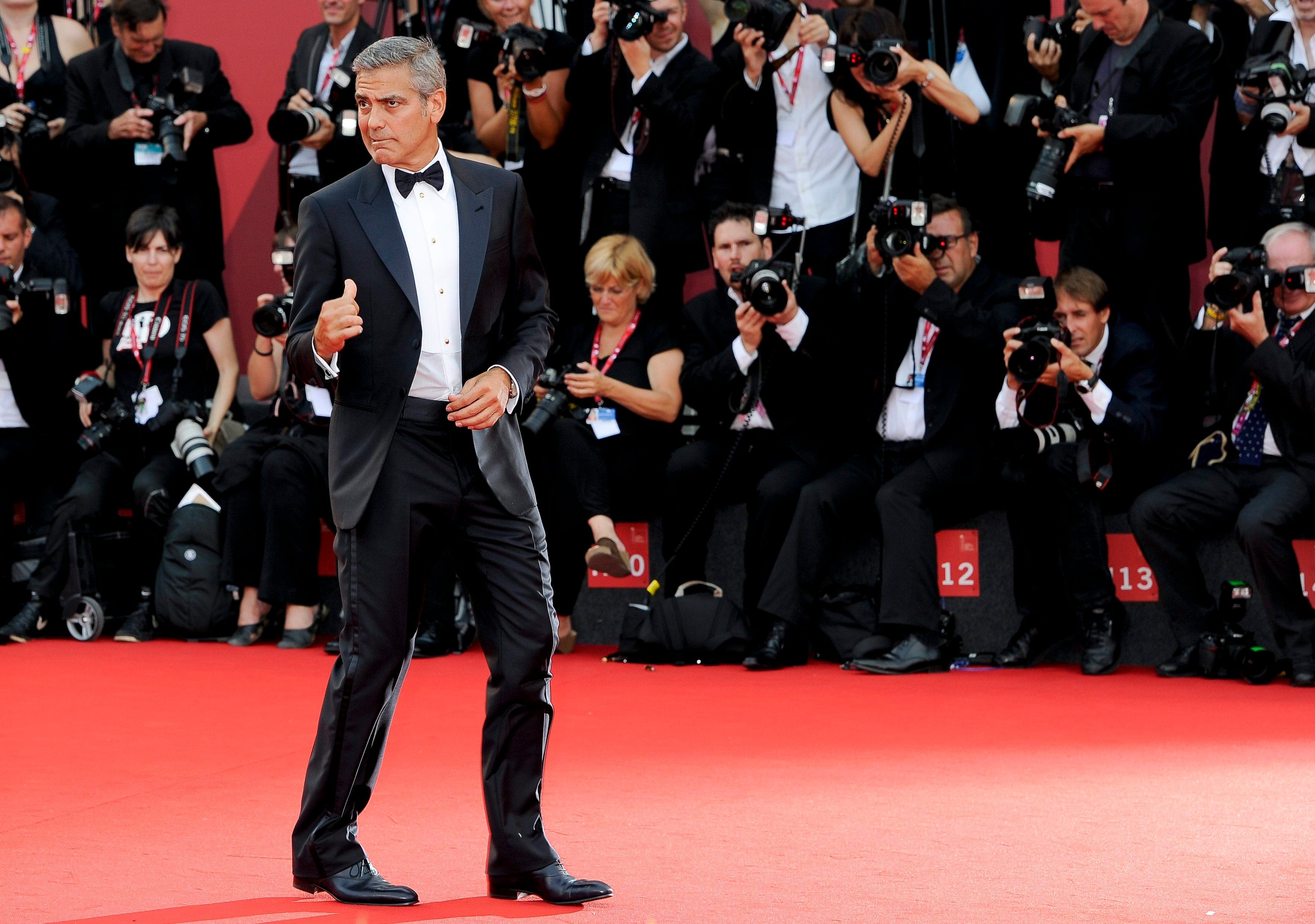 Clooney graces the red carpet in Venice