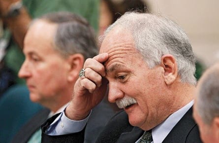 Canada's Public Safety Minister Toews and Justice Minister Nicholson wait to testify on Parliament Hill in Ottawa