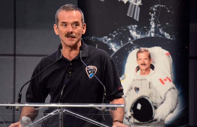 Chris Hadfield speaks at a news conference in Longueuil, Que., Monda, where he announced his plans to retire from the Canadian Space Agency. Paul Chiasson/CP