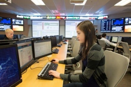 A student on the campus trading floor at the University of Lethbridge (Chris Bolin)