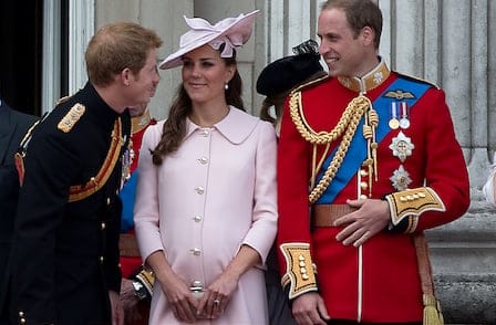 Prince Harry, Prince William and Catherine, Duchess of Cambridge stand on the balcony of Buckingham Palace after the Trooping the Colour ceremony in central London