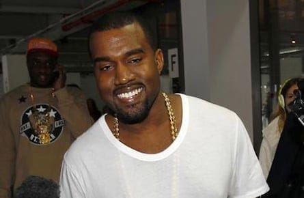 U.S. musician Kanye West arrives for the presentation of the Christopher Kane 2012 Spring/Summer collection during London Fashion Week