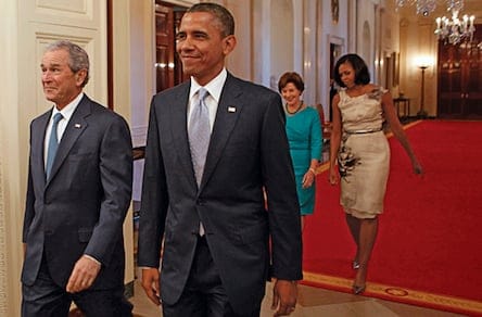 Former U.S. President Bush and first lady arrive for unveiling of Bush's official portraits at the White House in Washington