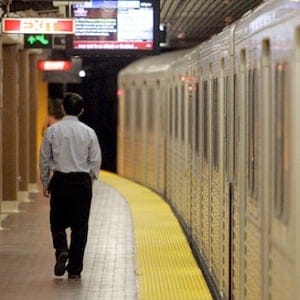 A transit rider walks on the subway platform at Union Station in Toronto