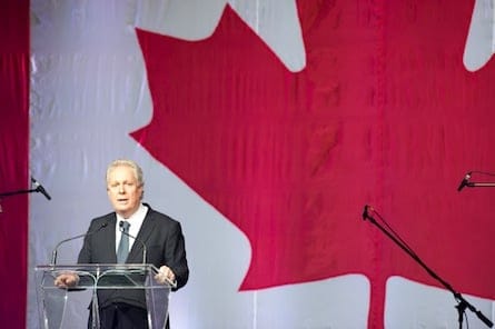 Jean Charest salutes Chrétien.