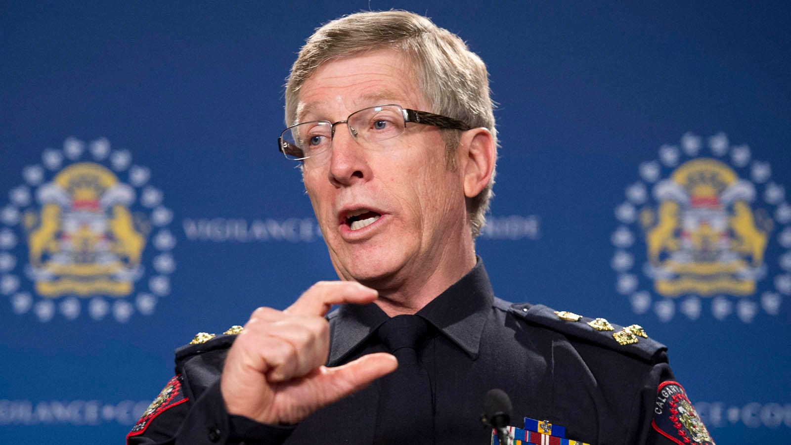 Calgary police chief Rick Hanson holds a press conference regarding the multiple fatal stabbing in Calgary on Tuesday, April 15, 2014. The suspect in the stabbing deaths of five young people in Calgary is the son of a senior officer with the city police force. Hanson says the arrested man is a student at the University of Calgary and was an invited guest at a house party celebrating the end of the school year. THE CANADIAN PRESS/Larry MacDougal