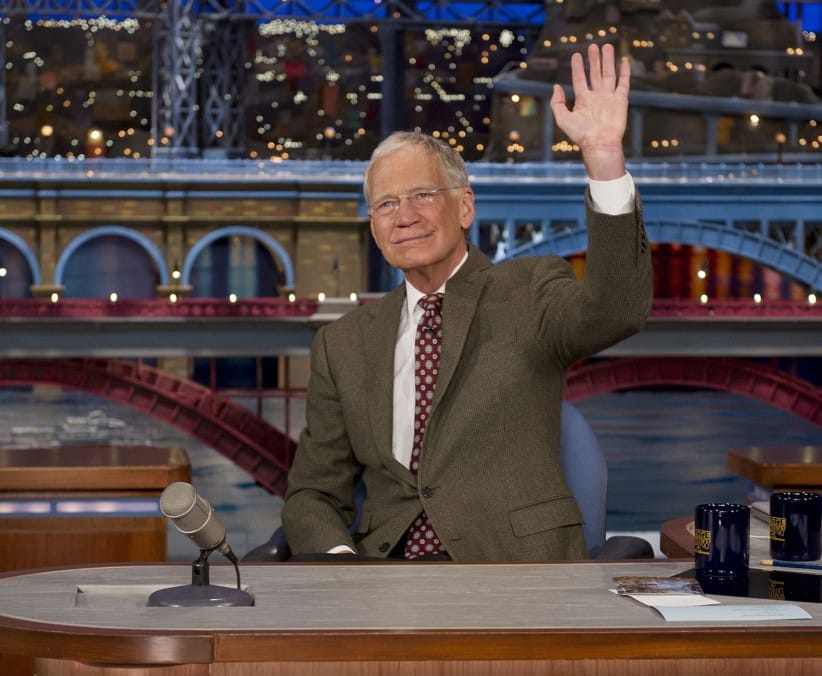 David Letterman, host of the Late Show with David Letterman, waves to the audience in New York on Thursday, April 3, 2014, after announcing that he will retire sometime in 2015. (CBS)
