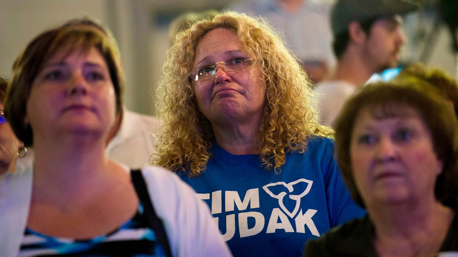 Ontario Progressive Conservative supporters watch the election results at Tim Hudak's campaign head quarters in Grimsby, Ont., on Thursday, June 12, 2014. THE CANADIAN PRESS/Nathan Denette