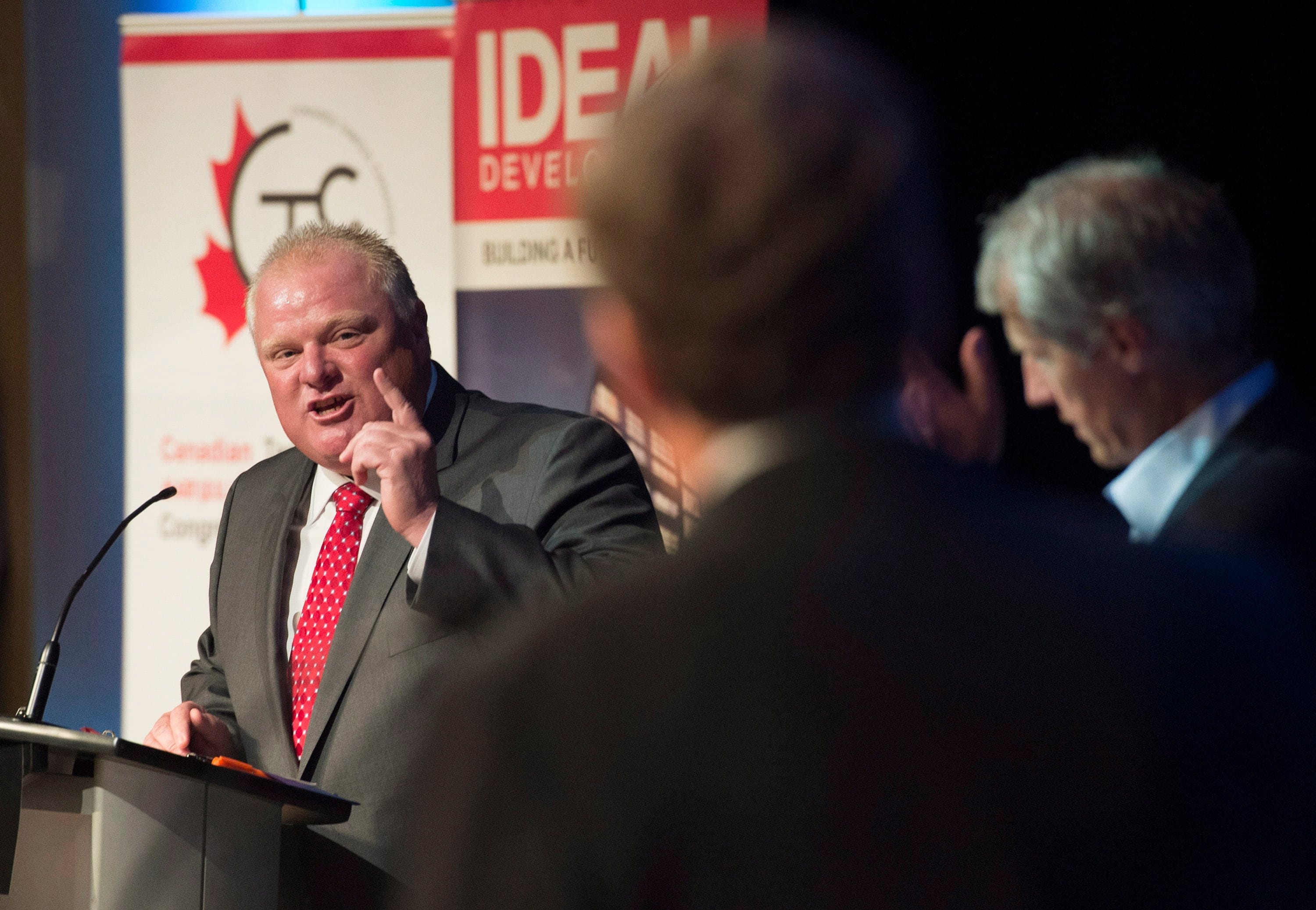 Mayor Rob Ford, left, debates with fellow mayoral candidates John Tory, centre, and David Soknacki during a mayoral debate in Toronto on Tuesday, July 15, 2014. (Darren Calabrese/The Canadian Press)