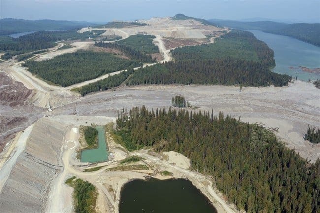 Damage from a tailings pond breach is seen near Likely, B.C. on Tuesday. A tailings pond that breached Monday, releasing a slurry of contaminated water and mine waste into several central British Columbia waterways, had been growing at an unsustainable rate, an environmental consultant says. (Jonathan Hayward/The Canadian Press)