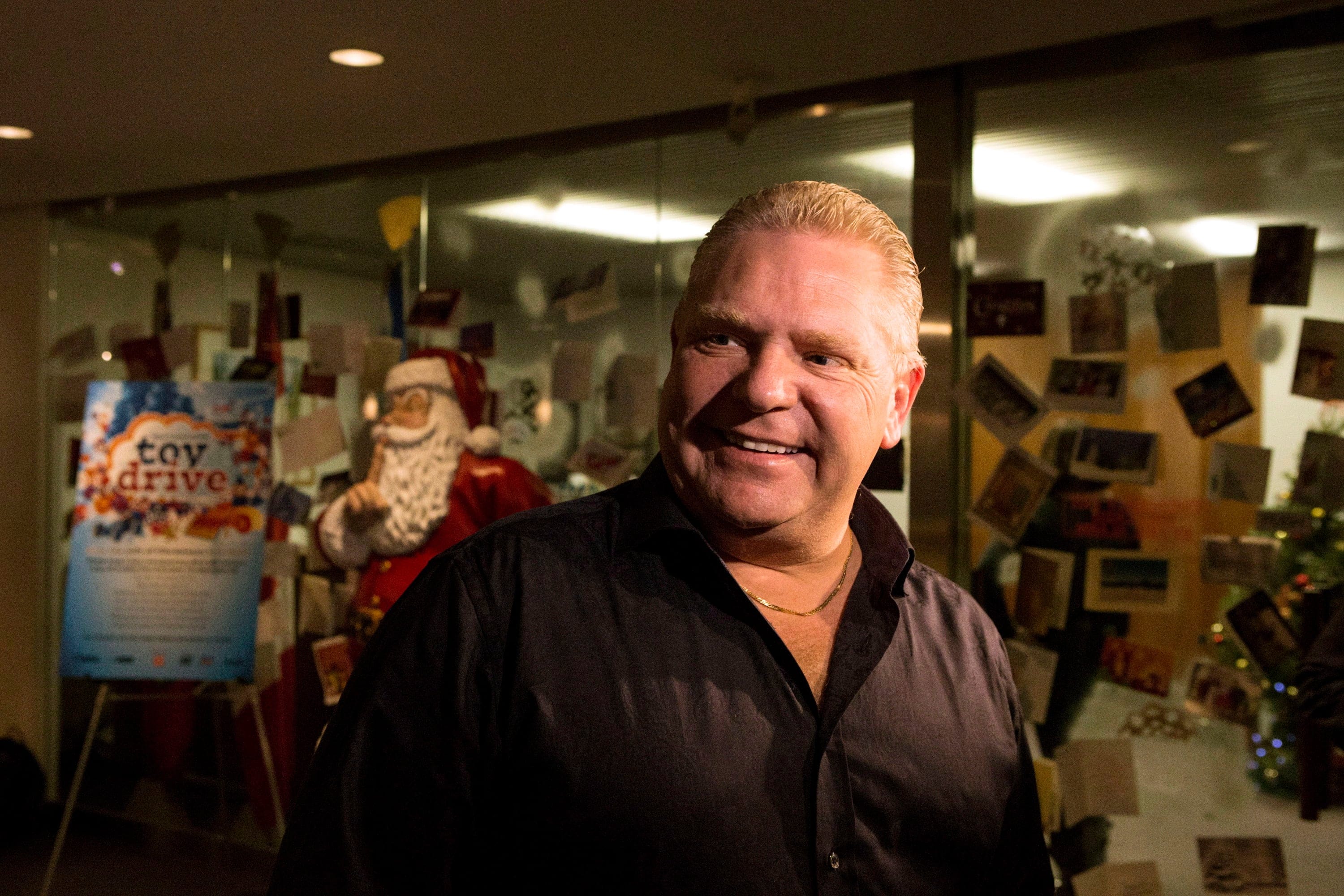 Toronto City Councillor Doug Ford stands outside his brother Mayor Rob Ford's office at city hall in Toronto on Friday December 20 2013. (Chris Young/The Canadian Press)