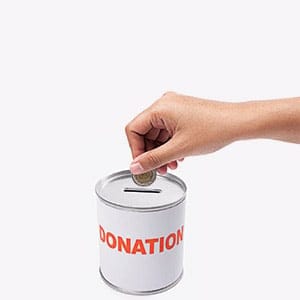 Hand with coin for Who Earns What