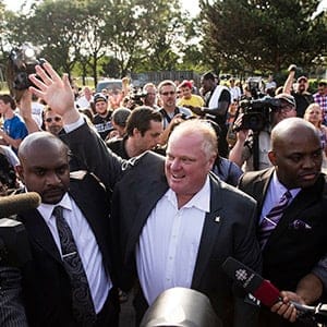 Toronto Mayor Ford arrives at "Ford Fest", a party held by the Ford family where the public is invited, at Thomson Memorial Park in Toronto