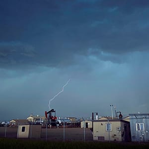 Lighting strikes over an EnCana compressor station near Drumheller.