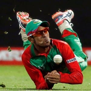 Bangladesh's Hossain drops a catch from New Zealand's Cory Anderson during their Cricket World Cup match in Hamilton