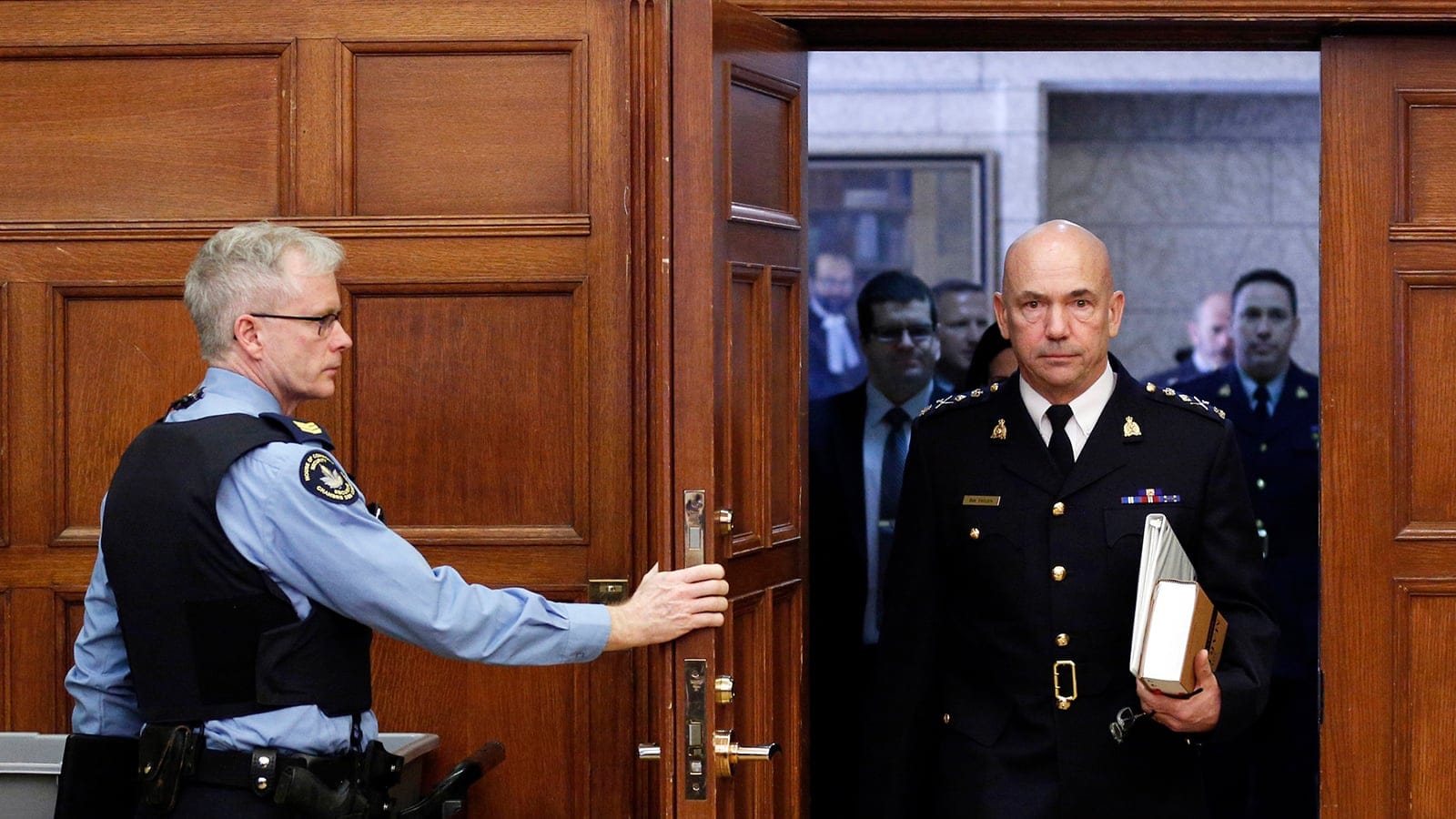 Royal Canadian Mounted Police Commissioner Bob Paulson prepares for a public safety committee meeting on Parliament Hill in Ottawa