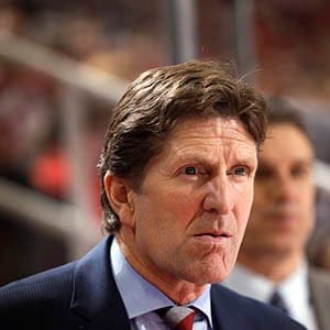 Detroit Red Wings head coach Mike Babcock watches the second period of an NHL hockey game against the New Jersey Devils in Detroit, Friday, Nov. 7, 2014. (Paul Sancya/AP)