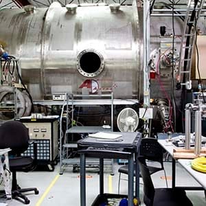 CEO of Ad Astra Rocket Company Dr. Franklin Chang-Diaz is photographed in front of Ad Astra's vacuum chamber Thursday afternoon March 19, 2015 where they test their Variable Specific Impulse Magnetoplasma Rocket (VASIMR®) technology. Photograph by Nathan Lindstrom.