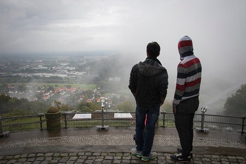 Minden, Germany Qassim Ali (left) and his friend from the refugee shelter at the power station in Veltheim taken in the view of Minden and Porta Westfalica from the Kaisar Wilhelm monument. (Photograph by Adnan R. Khan)