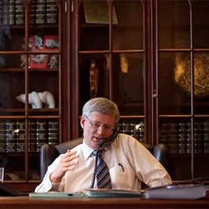 Stephen Harper speaks with President Hollande on January 16, 2013. (PMO/Flickr)