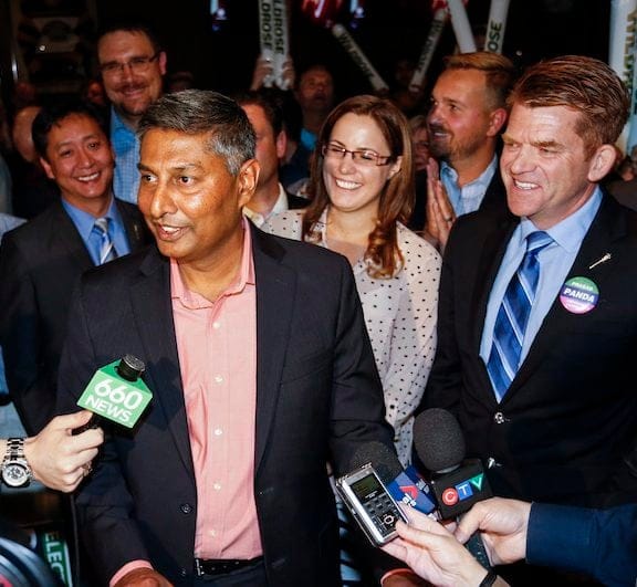 Wildrose candidate Prasad Panda, centre, celebrates his victory with supporters and Wildrose leader Brian Jean, second from right, in the Calgary Foothills byelection in Calgary, Alta., on Thursday, September 3, 2015. Former Premier Jim Prentice vacated the seat following his electoral defeat in May. THE CANADIAN PRESS/Jeff McIntosh