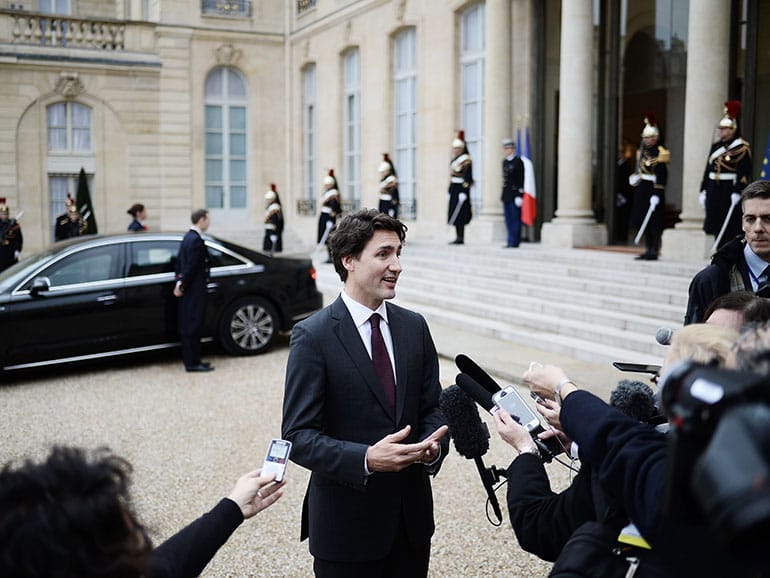 Canadian Prime Minister Justin Trudeau speaks to journalists after his meeting with French President Francois Hollande on November 29, 2015 at the Elysee palace in Paris. (Stephane de Sakutin/AFP/Getty Images)