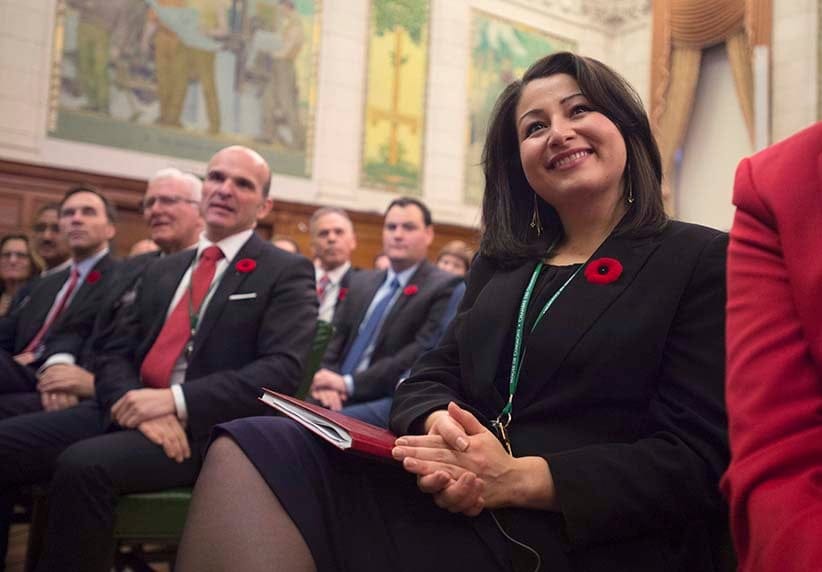 Minister of Democratic Institutions Maryam Monsef, right, takes part in a Liberal caucus meeting on Parliament Hill in Ottawa on Thursday, November 5, 2015. (Sean Kilpatrick/CP)