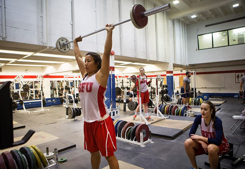 September 30, 2015 - BURNABY: SFU basketball player Vanessa Gee (left) works out as fellow player Elisa Homer watches at Fraser University in Burnaby. (Photograph by Della Rollins)